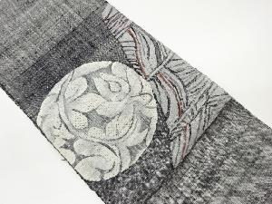 手織り真綿紬丸文に花唐草・抽象模様織出し名古屋帯